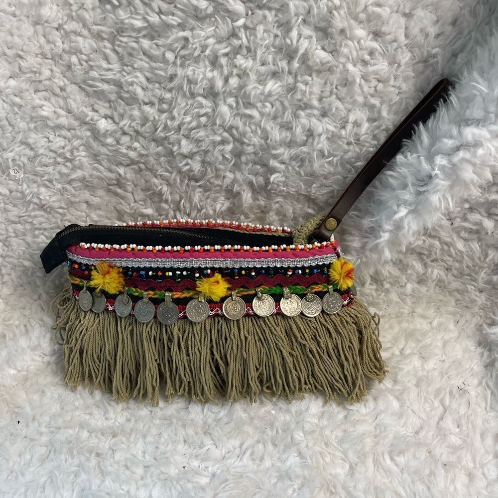 - Elliott Mann Indie multi color clutch with beads and coins accents.